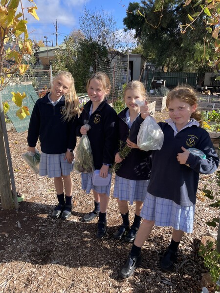 Chloe, Annabelle, Stella & Charlotte with their produce