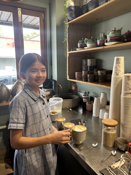 Amalie making coffee