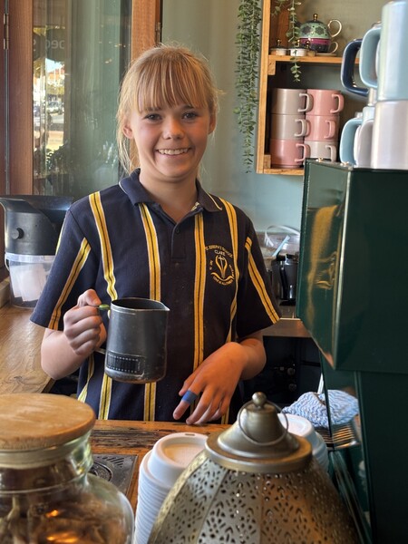 Charlii making coffee