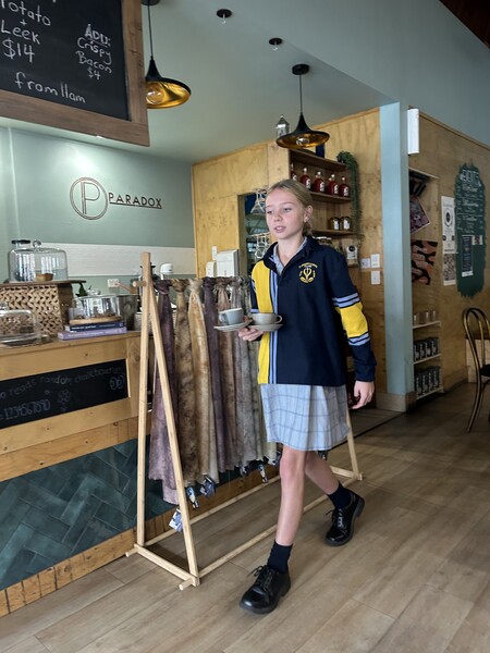 Iyla serving coffee