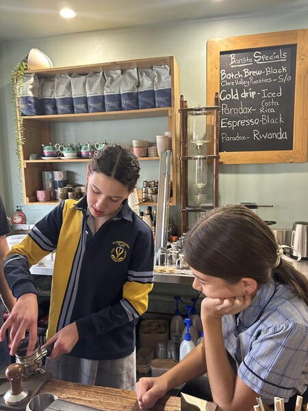 Jess and Amalie making coffee