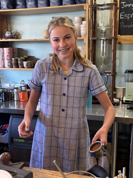 Lucy W making coffee
