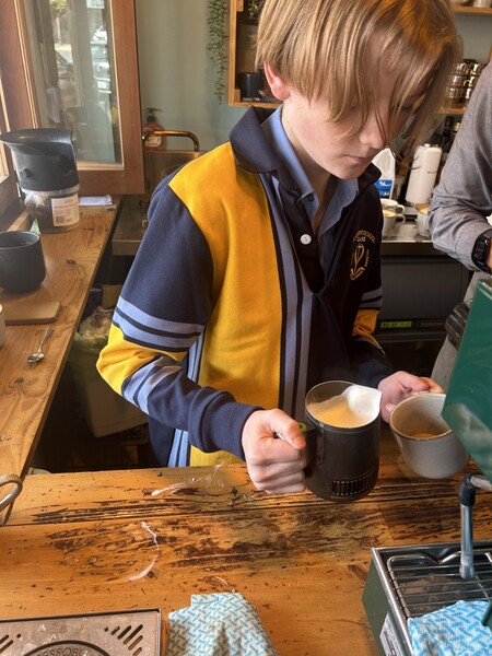 Max making coffee